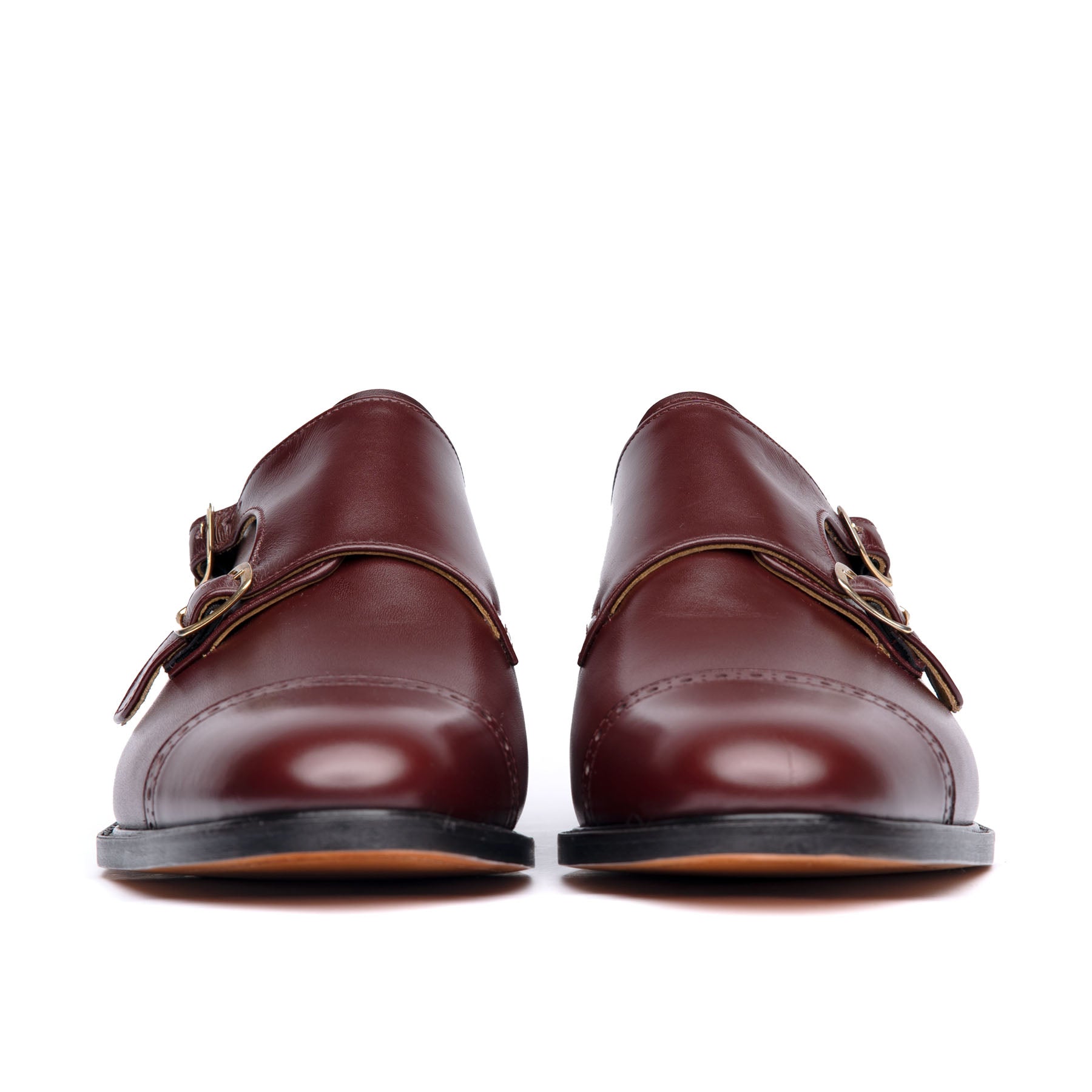 Burgundy monk strap shoes with double buckles and leather sole