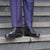 Black cap toe oxford shoes paired beautiful with 100% wool dress pant for corporate events and weddings