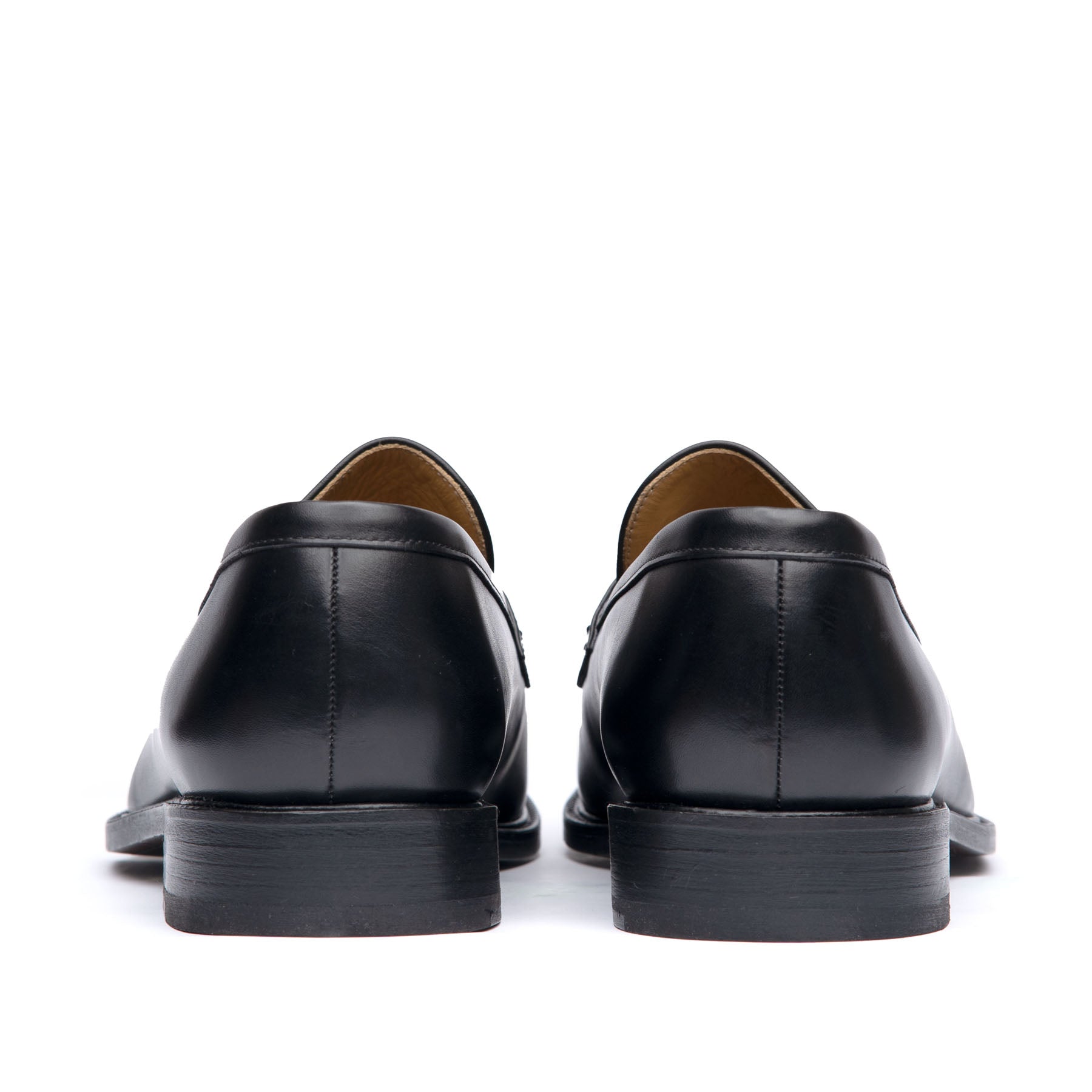 Mens dress penny loafers with stacked leather heel and rubber pad injection