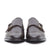 Brown double monk strap shoes with brogues at the cap toe and leather sole