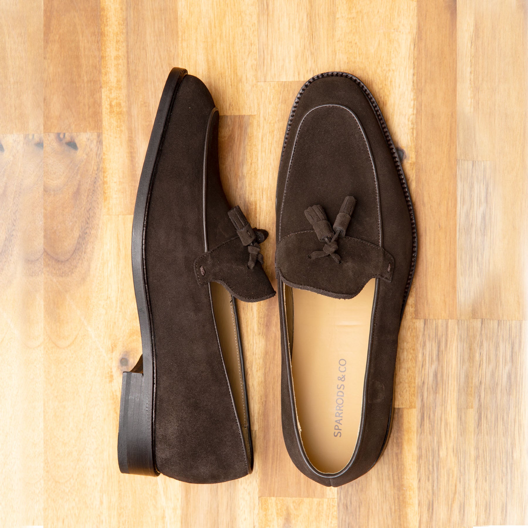 Suede tassel loafers crafted by highly skilled Artisan for all year wear