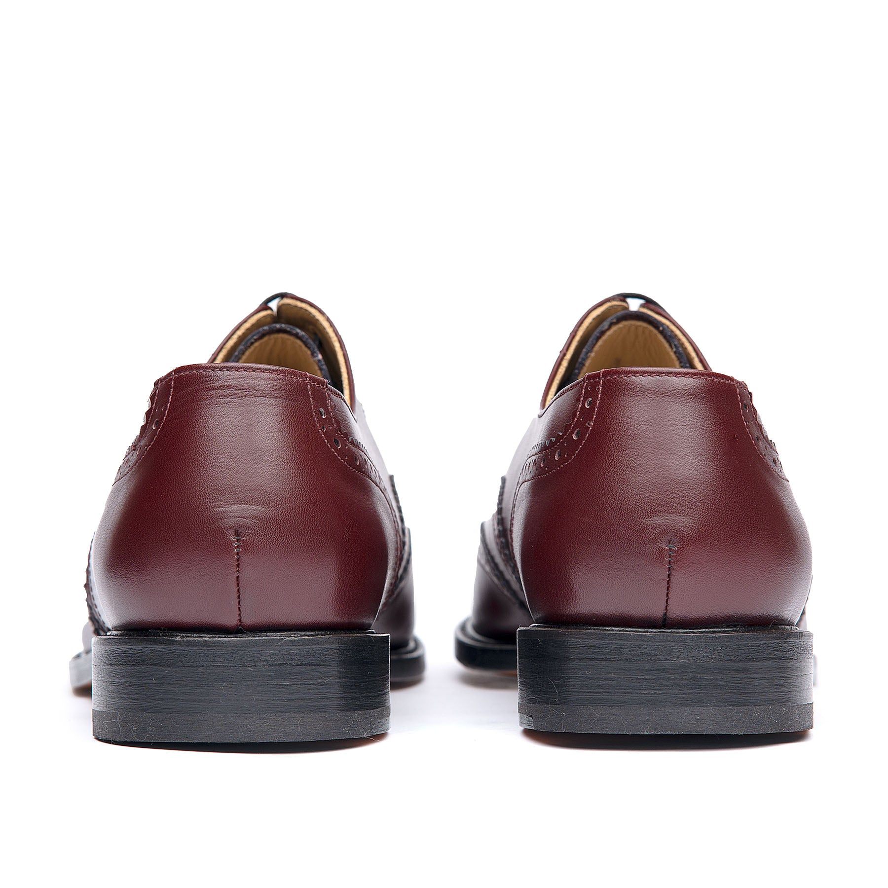 Oxblood brogue shoes with stacked leather heel and rubber injection