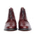 Burgundy dress boots featuring full grain leather,  open lace system and patina on the toe cap