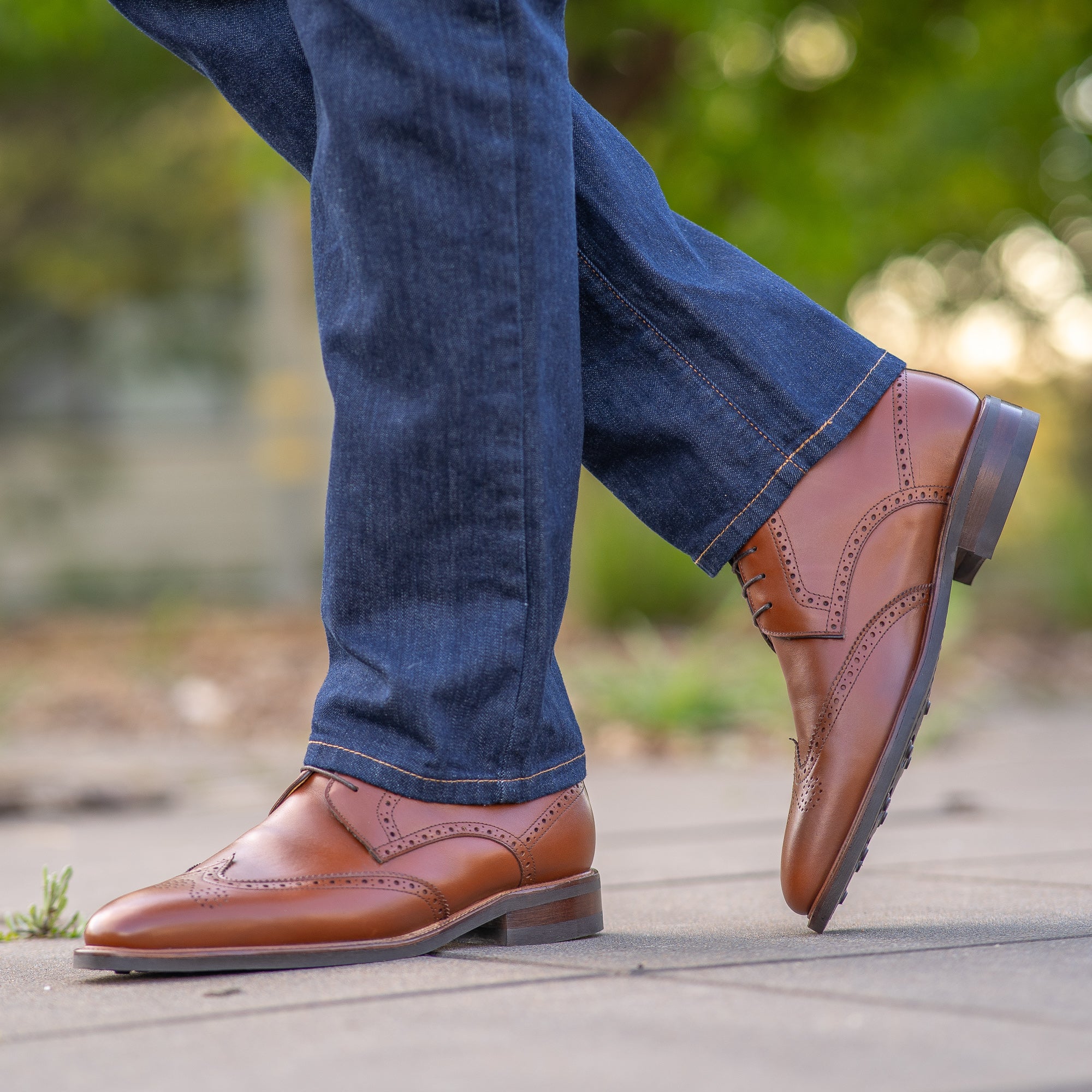 Mens lace up brogue boots in tan leather styled with long sleeve shirt and denim for casual smart styling