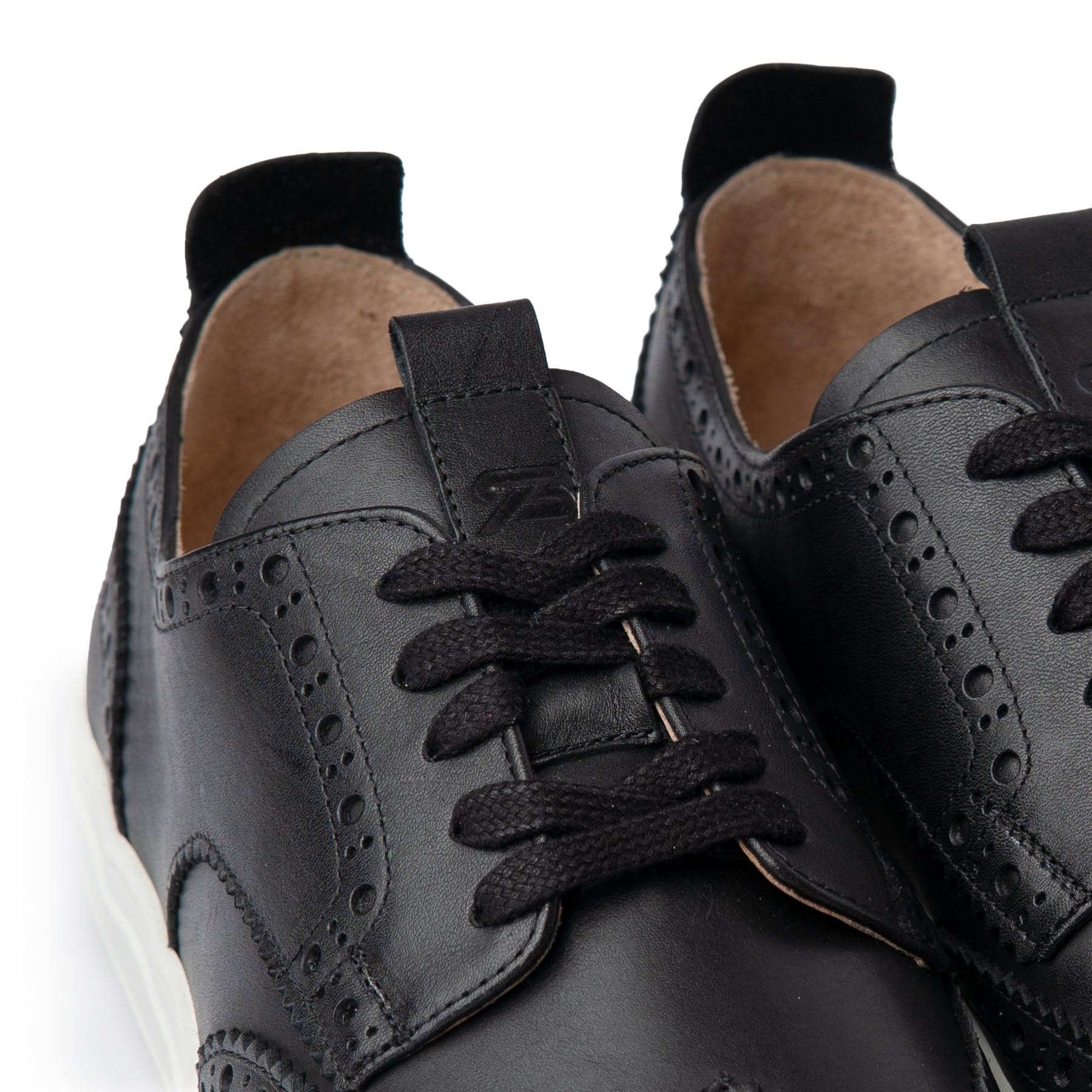 Alpha low top brogues sneakers, handmade from finest calfskin leather with perforation on the leather upper