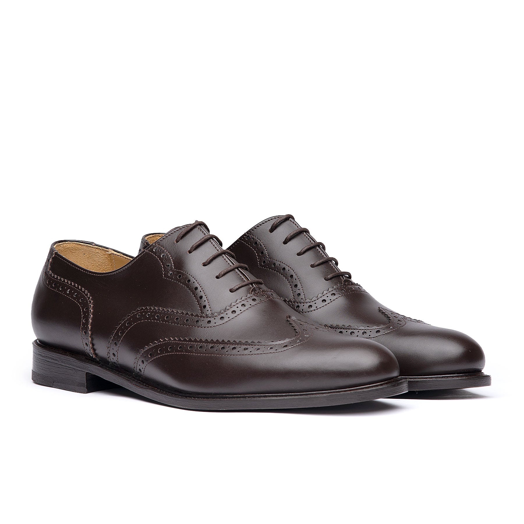 Men's brown wingtip shoes with brogues and leather sole for both formal and casual wear