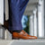 Tan monk strap shoes paired with navy blue suits and tuxedo