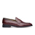 Burgundy penny loafers with handstitched apron and contrasting black leather at the edges