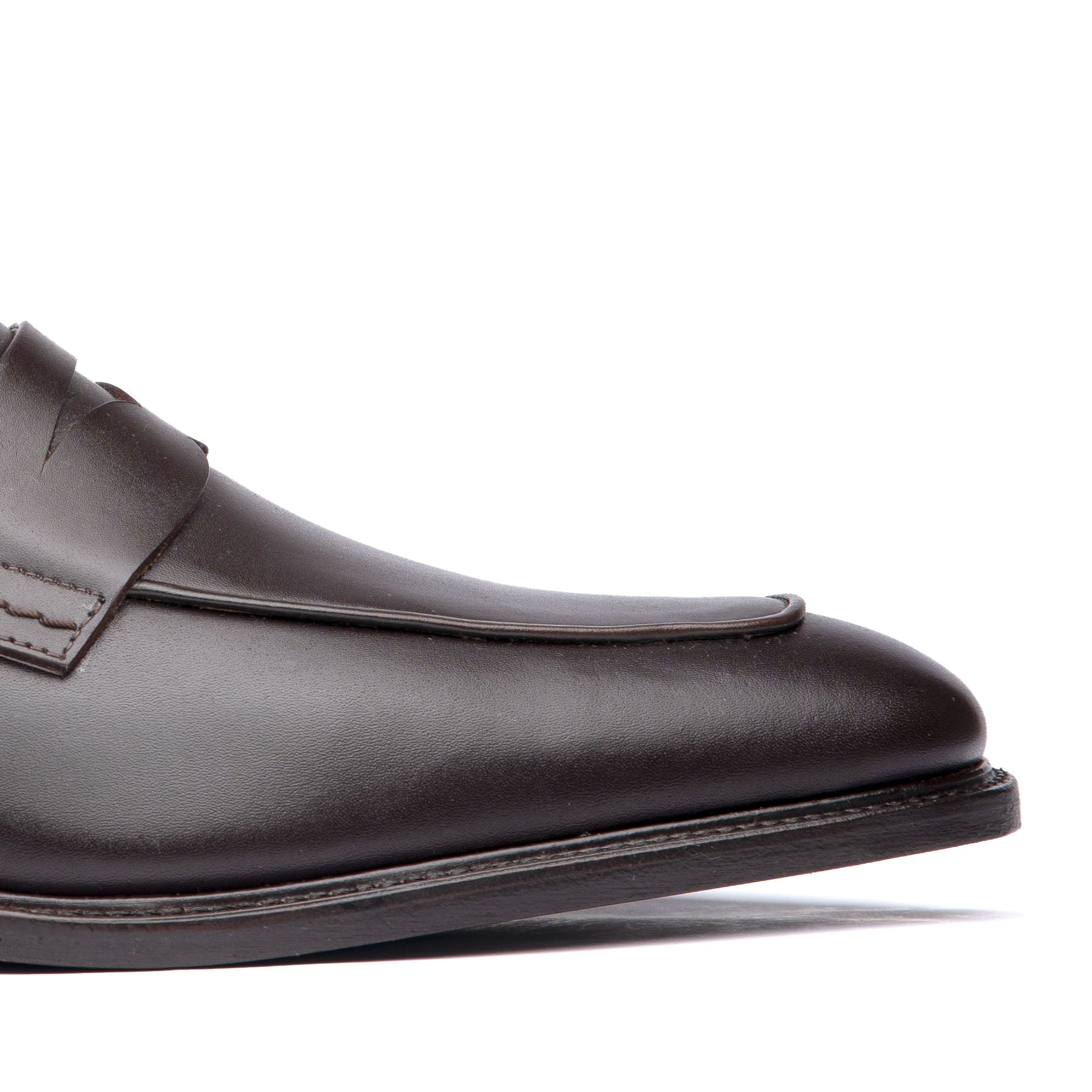 Mens brown dress loafers made with luxurious full grain calfskin leather with no lacing system.