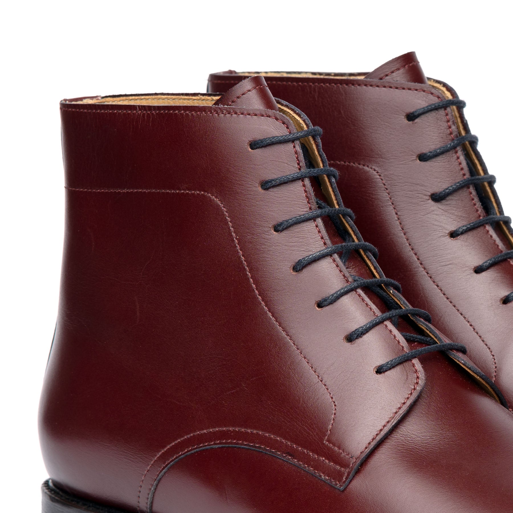 Mens burgundy dress boots made from full grain calfskin leather with blind eyelets