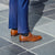 Men's buckle dress shoes paired beautifully with smart ankle trousers and flannel jacket