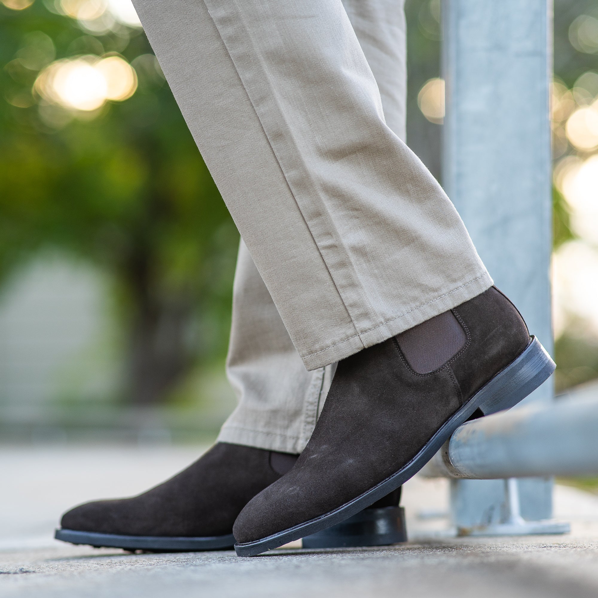 Brown suede chelsea boots styled nicely with chinos for going out