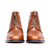 Mens tan lace up boots with open lace system and hand polished for perfection