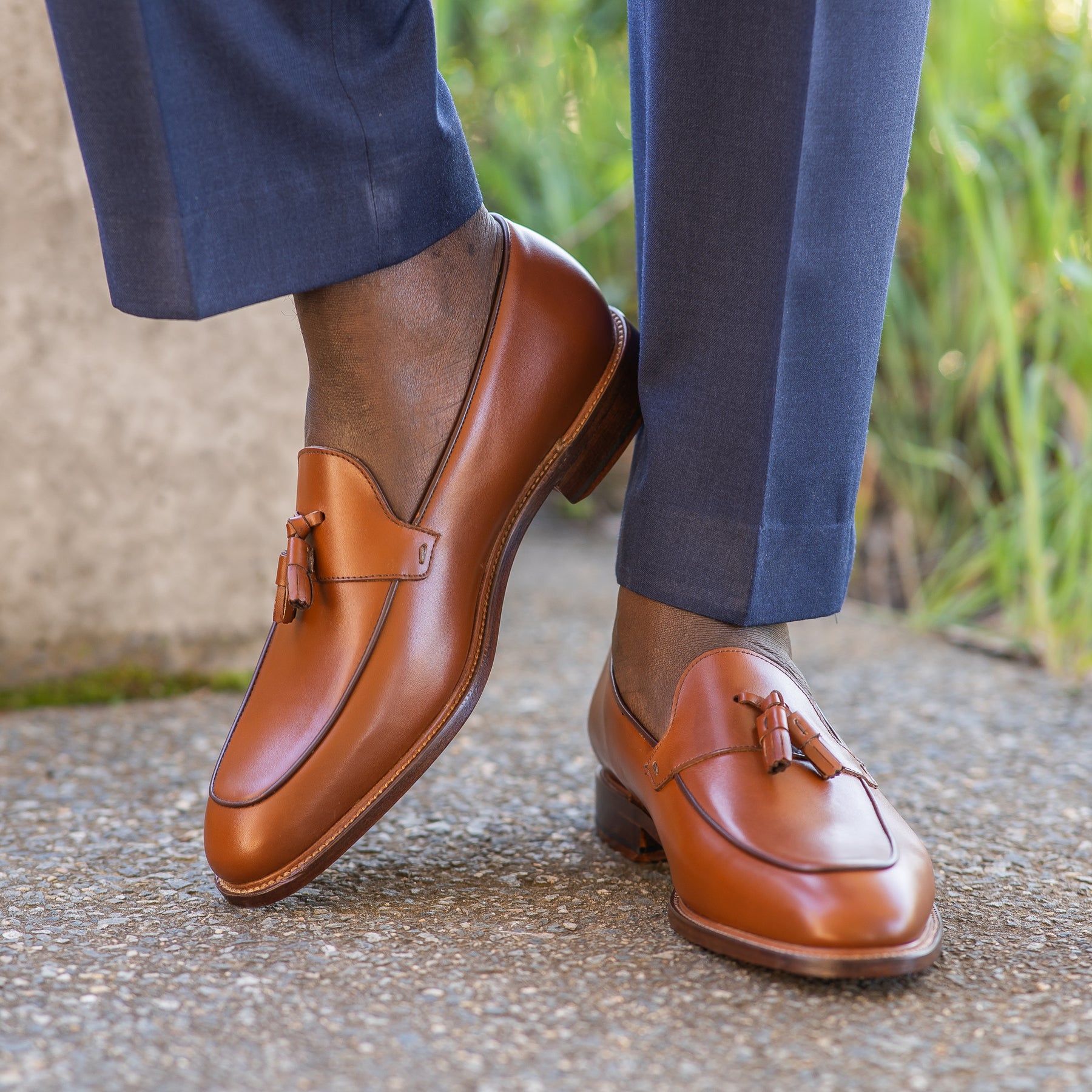 Mens tassel loafer paired with blue merino wool woven trousers