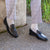 Comfortable tassel loafer paired with textured suit pant