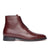 Mens oxblood boots featuring single leather sole, welted construction and blind eyelets