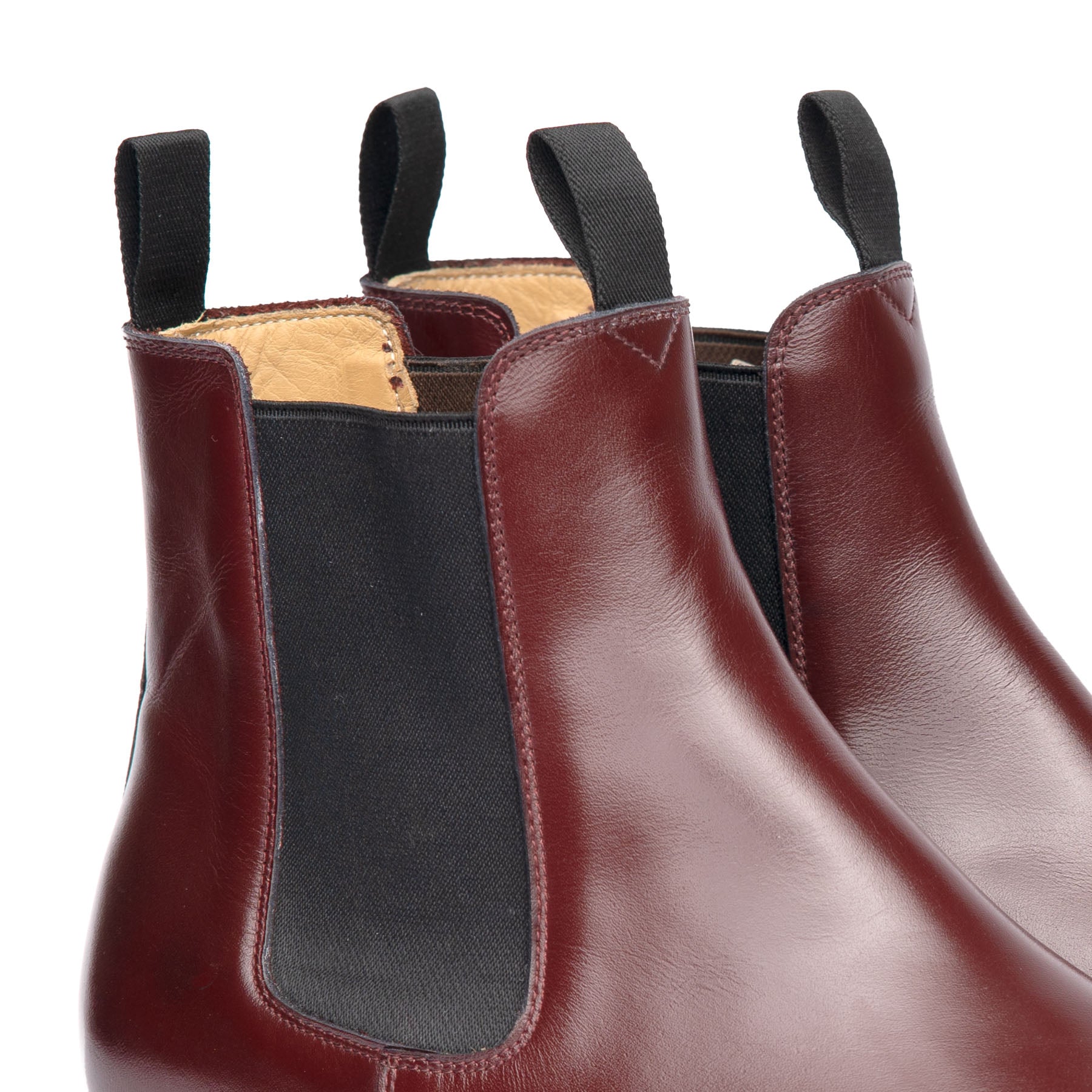 Oxblood chelsea boot crafted from natural box calfskin leather with elastic side panel