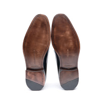 Mens brown suede boots with welted construction and single leather sole