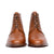 High quality mens tan leather boots featuring almond toe and beautiful patina at the toe cap 