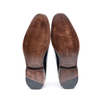 Brown suede tassel loafer with leather sole and blake rapid stitched construction