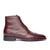 Men's wingtip boot in rich oxblood, fully lined with calfskin leather and traditional brogues on the upper leather